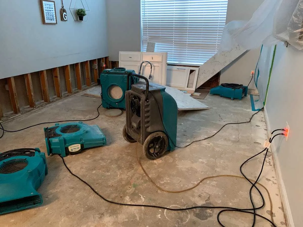Dehumidifier in flood-cut room for Water Damage Restoration in Newbury